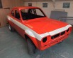 Escort Painted in Seventies Race Colours